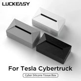 Tesla Cybertruck silicone tissue box in black, white, and gray, designed for car interior, with stylish fix strap.