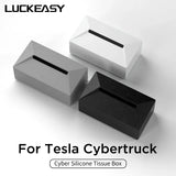 Tesla Cybertruck silicone tissue box in black, white, and gray, designed for car interior, with stylish fix strap.